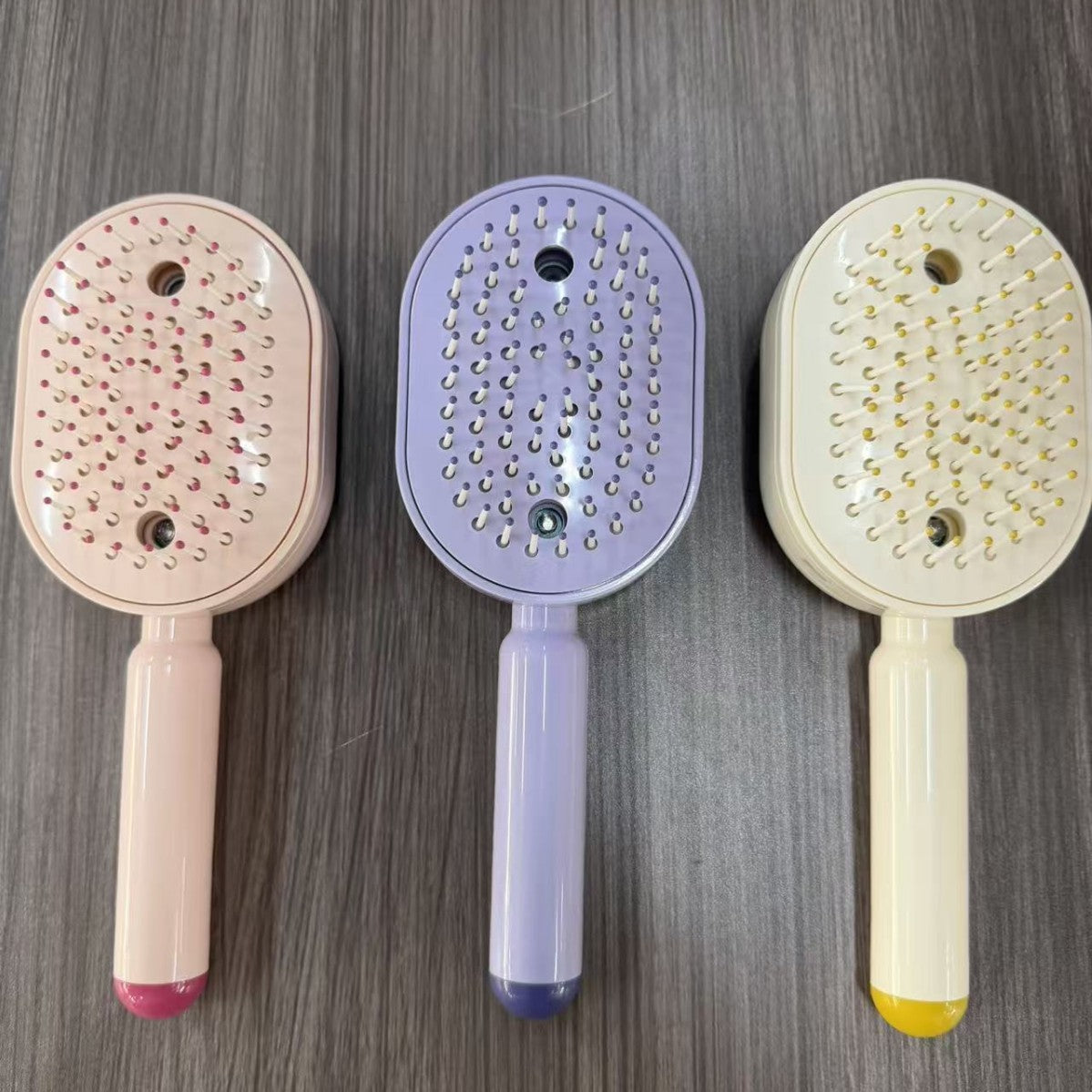 Electric Air Cushion Massage Comb with Mist Spray and Red Light Therapy